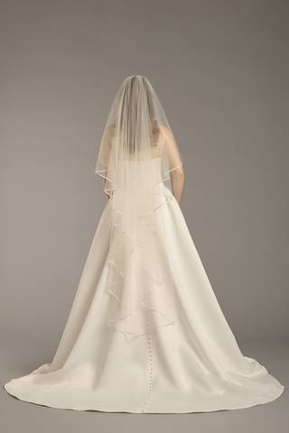 View DB Studio Satin Edge Angel-Cut Mid-Length Veil in all available color and sizes Picture of Satin Edge Angel-Cut Mid-Length Veil